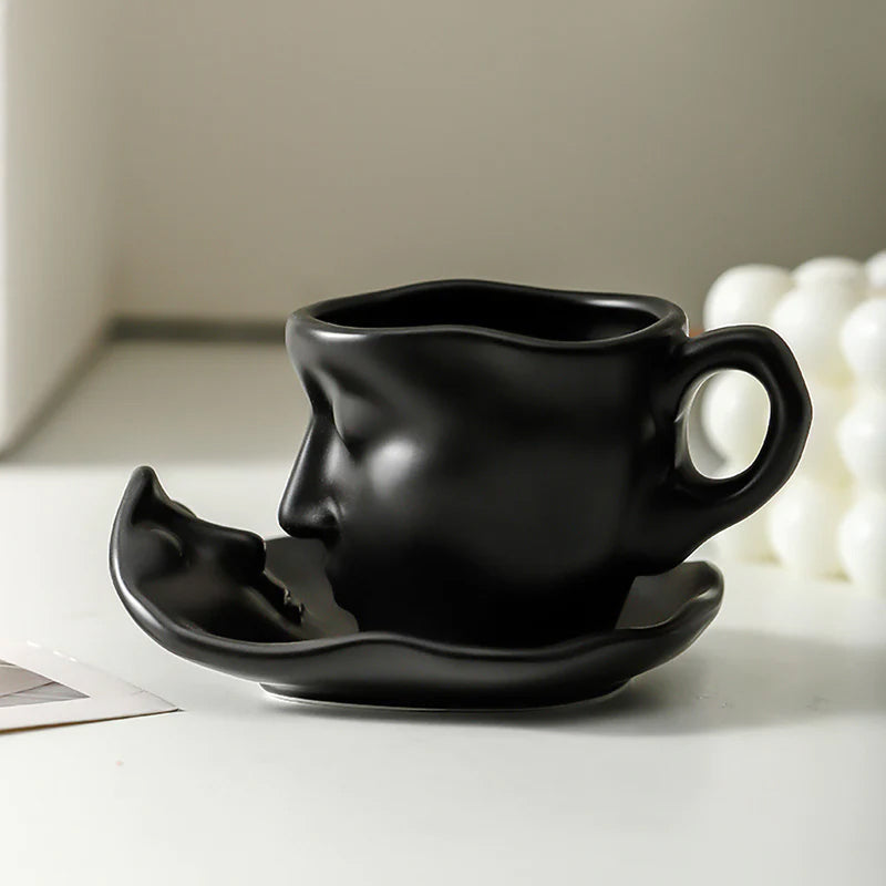 Skanto | Kyssnades Gesichts-Keramik-Kaffeetasse