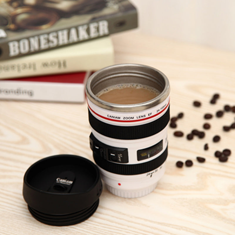 Skanto Skanto | Isolierter Kaffeebecher im Kameraobjektiv-Design