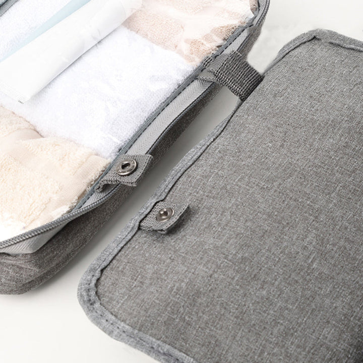 Skanto Skanto | Travelique Reise-Kosmetik-Organizer | Kompakt & Wasserabweisend | Mit 4 Fächern & 360°-Haken | Für Frauen & Männer