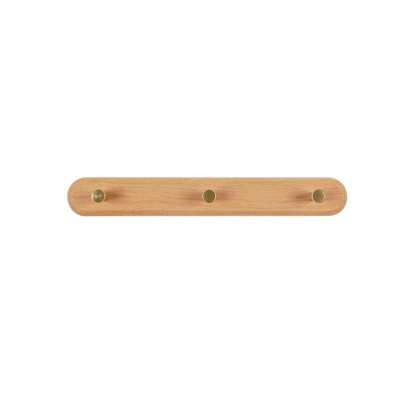 Skanto | WandHout – Minimalistische Wandgarderobe aus Holz mit Messinghaken