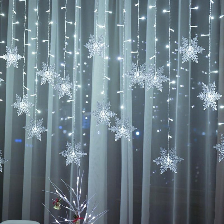 Skanto | LED-Lichtervorhang mit Schneeflocken | Innen- & Außenbereich