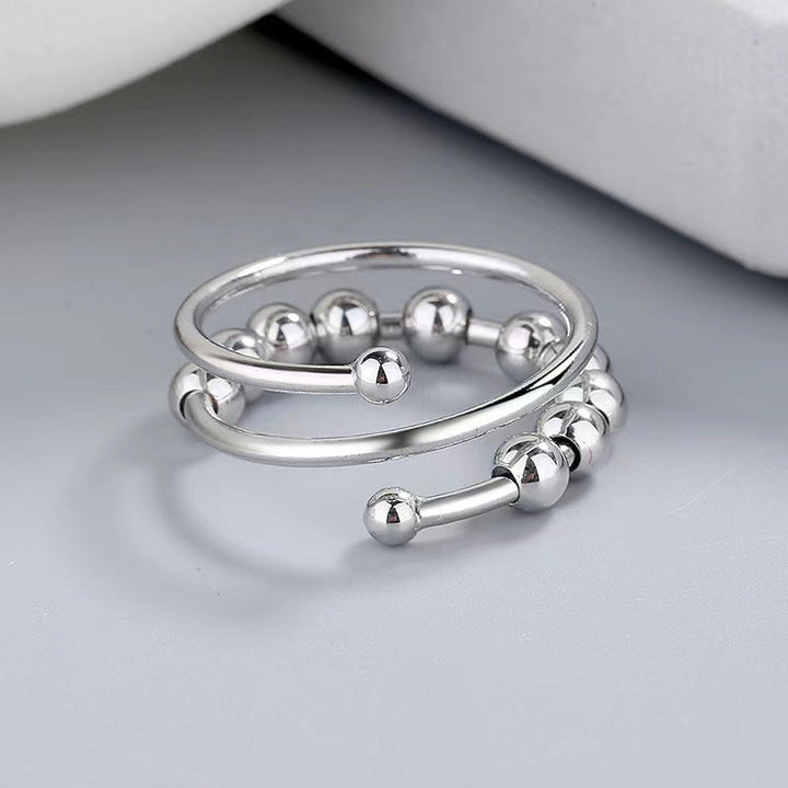 Skanto | Distribute Your Fears Kreisperlen Fidget Ring