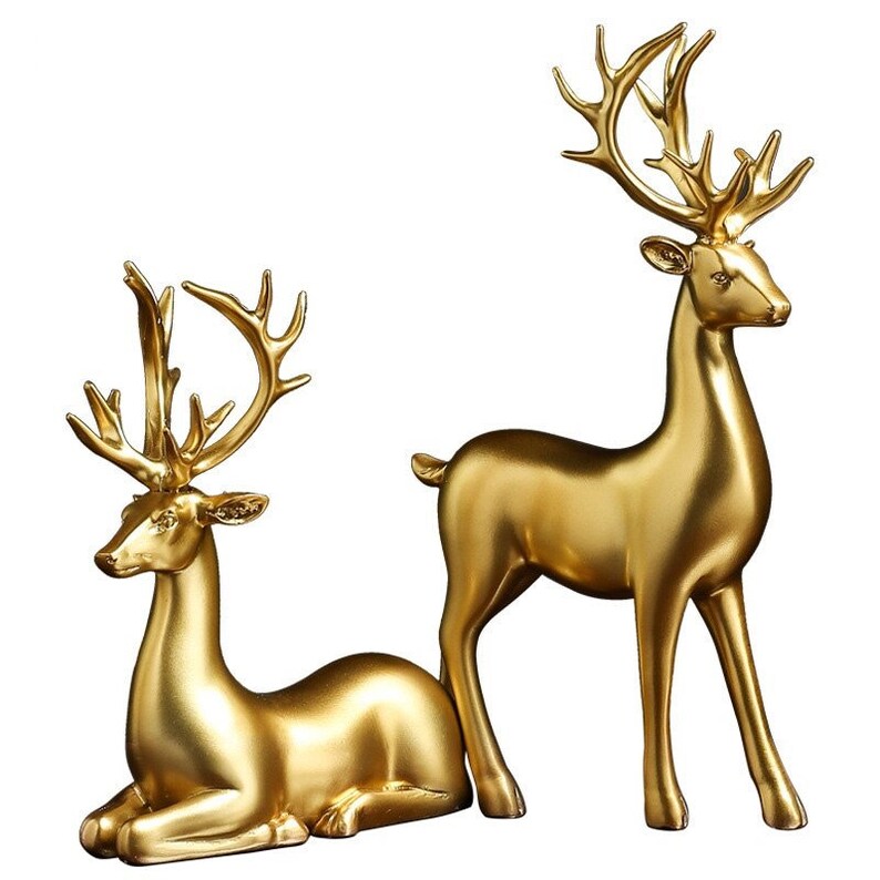 Skanto | Goldene Hirschfiguren
