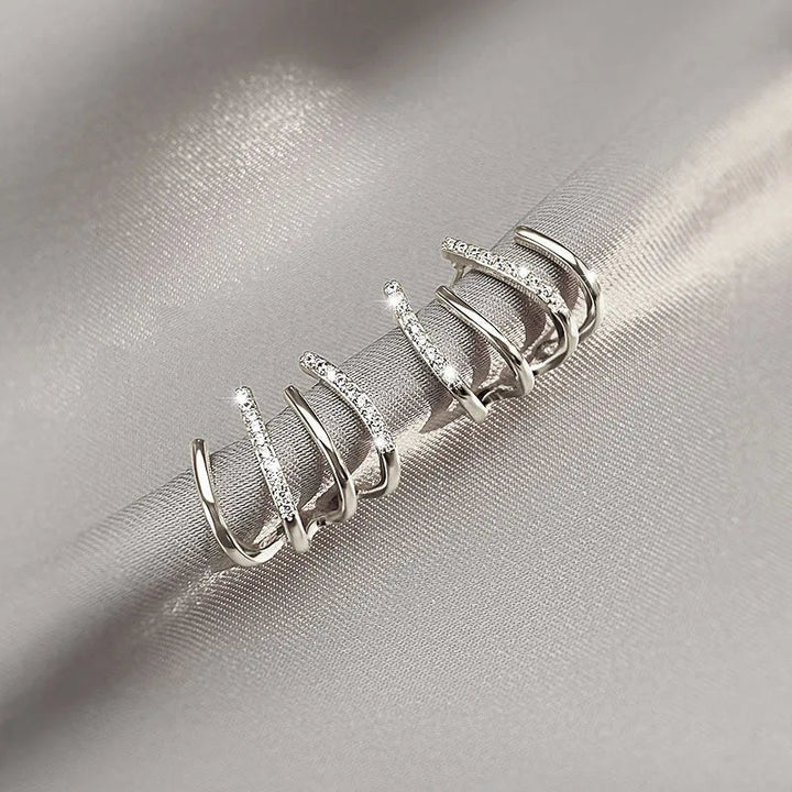 Skanto | Gedrehte Ohrringe | Elegantes Design | Gold oder Silber