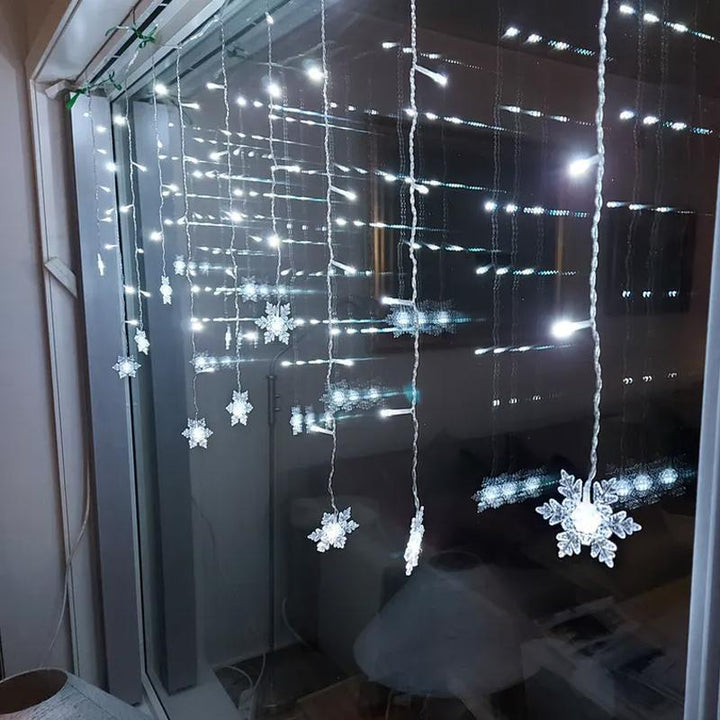 Skanto | LED-Lichtervorhang mit Schneeflocken | Innen- & Außenbereich