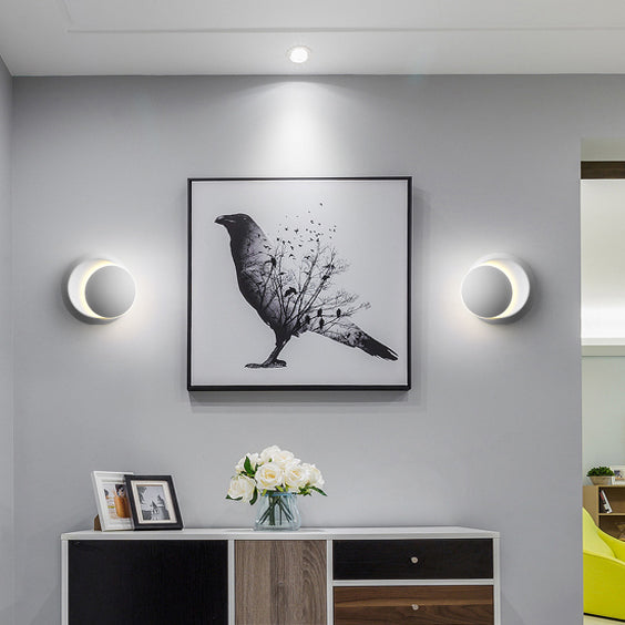 Skanto | Moderne nordische runde Eclipse LED-Wandleuchte aus Eisen, drehbar für Nachttisch