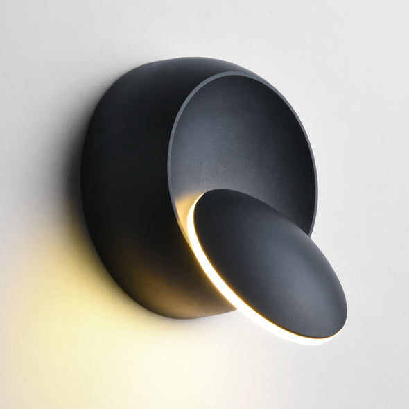 Skanto | Moderne nordische runde Eclipse LED-Wandleuchte aus Eisen, drehbar für Nachttisch