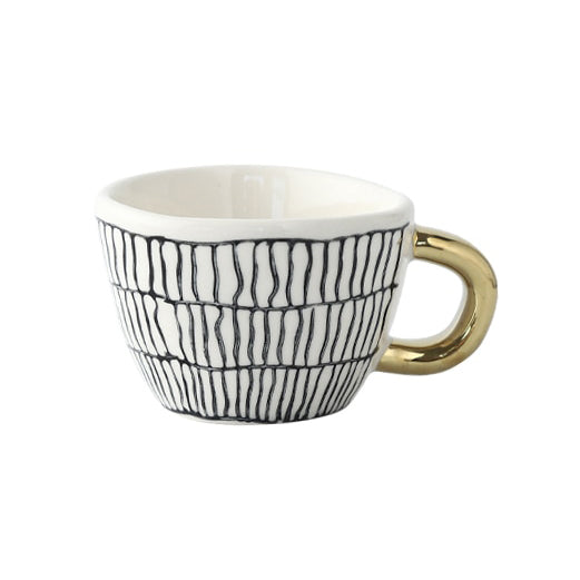 Skanto | Tasse mit abstraktem geometrischem Muster und Goldgriff