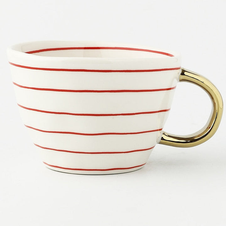 Skanto | Tasse mit abstraktem geometrischem Muster und Goldgriff