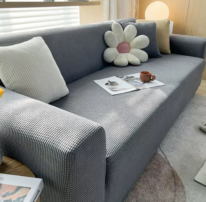 Skanto | CouchWrap – Leichter und rutschfester Sofabezug