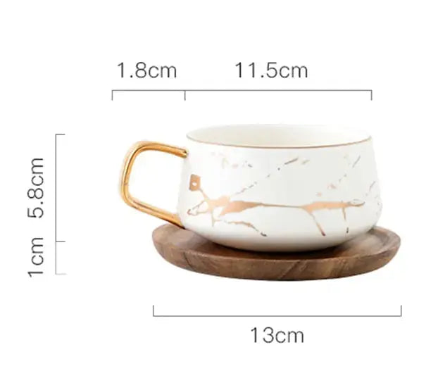 Skanto | Kaffeetasse mit Marmormuster und Goldverzierung