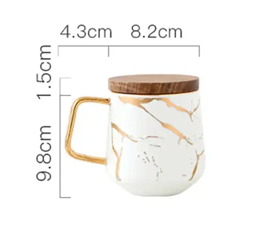 Skanto | Kaffeetasse mit Marmormuster und Goldverzierung