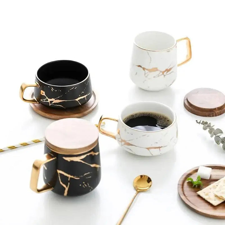 Skanto | Kaffeetasse mit Marmormuster und Goldverzierung
