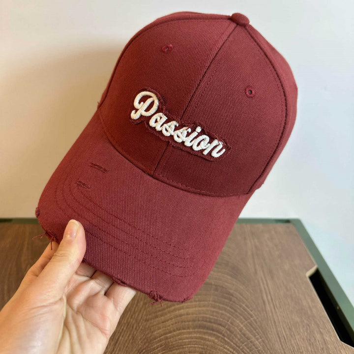 Damen Baseballkappe aus Baumwolle im Used-Look mit gesticktem Zitat Skanto