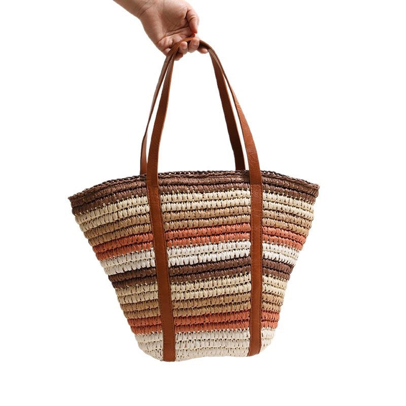 Geflochtene Strohtasche mit robusten Ledergriffen Skanto