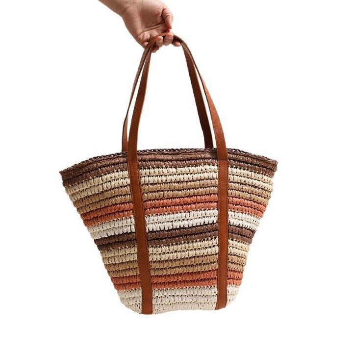 Geflochtene Strohtasche mit robusten Ledergriffen Skanto