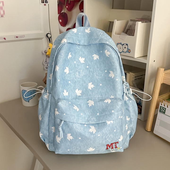 Moderner Schulrucksack mit Blattmuster