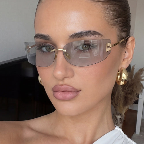 Damen futuristische Designer-Sonnenbrille mit ungewöhnlichem Rahmen und UV-Schutz Skanto