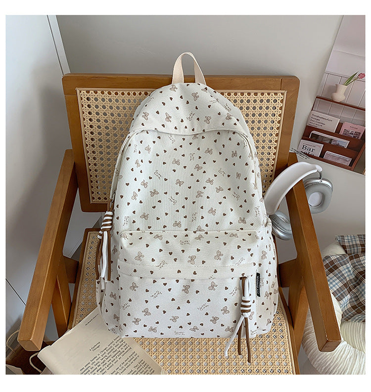 Niedlicher Schulrucksack mit dekorativem Muster