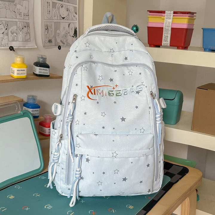 Schulrucksack mit Sternmuster und mehreren Fächern