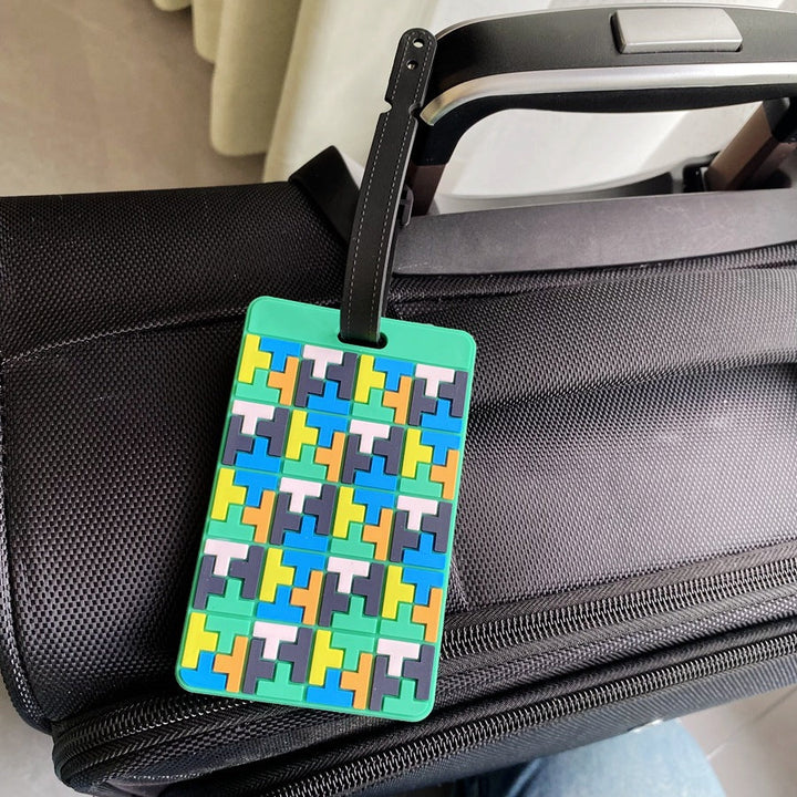 Lebhafter Puzzle-Muster Kofferanhänger Skanto