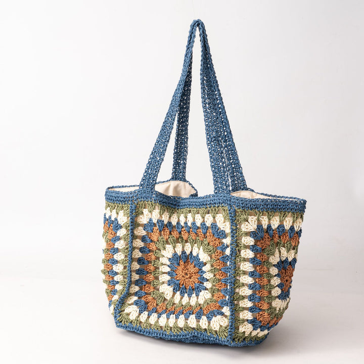 Strandtasche aus handgewebtem Naturmaterial mit Karomuster Skanto