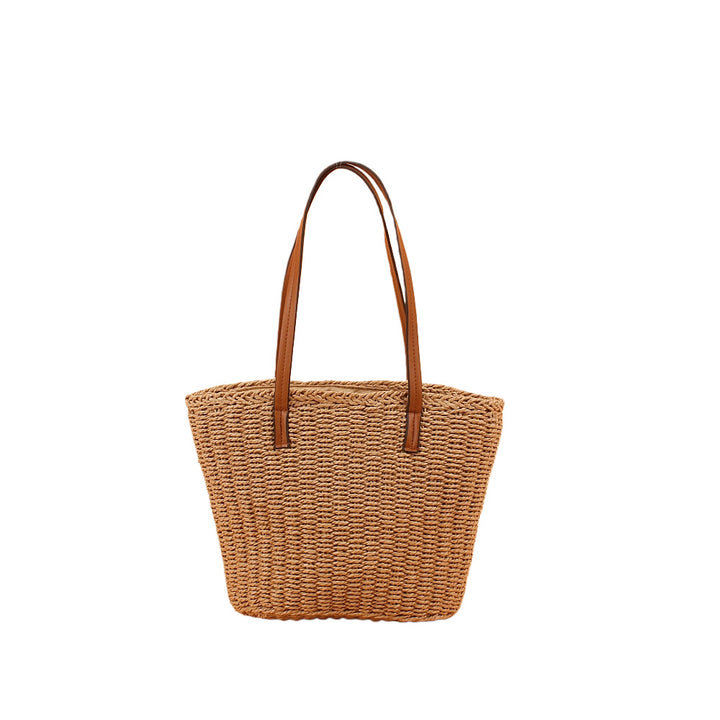 Handtasche aus handgeflochtenem Naturmaterial mit robusten Ledergriffen Skanto