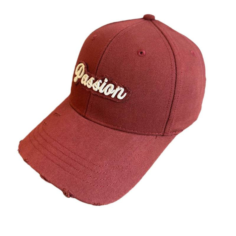 Damen Baseballkappe aus Baumwolle im Used-Look mit gesticktem Zitat Skanto