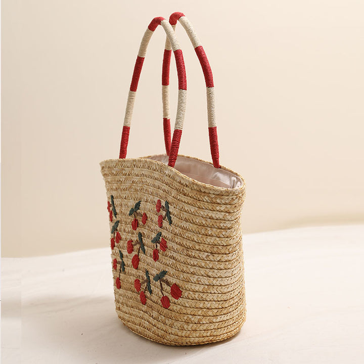 Handgemachte Korbtasche mit lebhaftem Blumenstickerei-Design Skanto