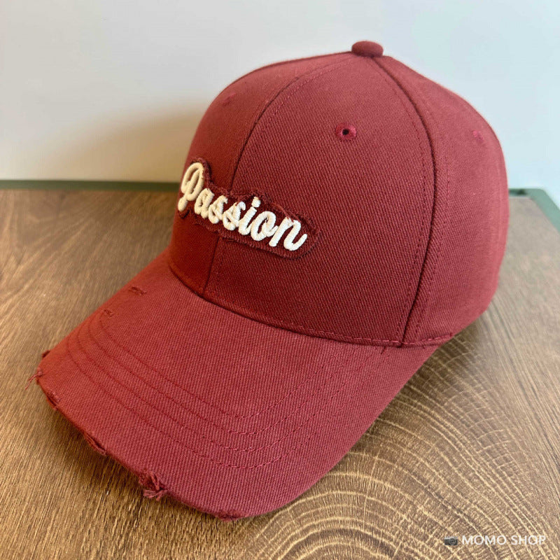 Damen Baseballkappe aus Baumwolle im Used-Look mit gesticktem Zitat Skanto