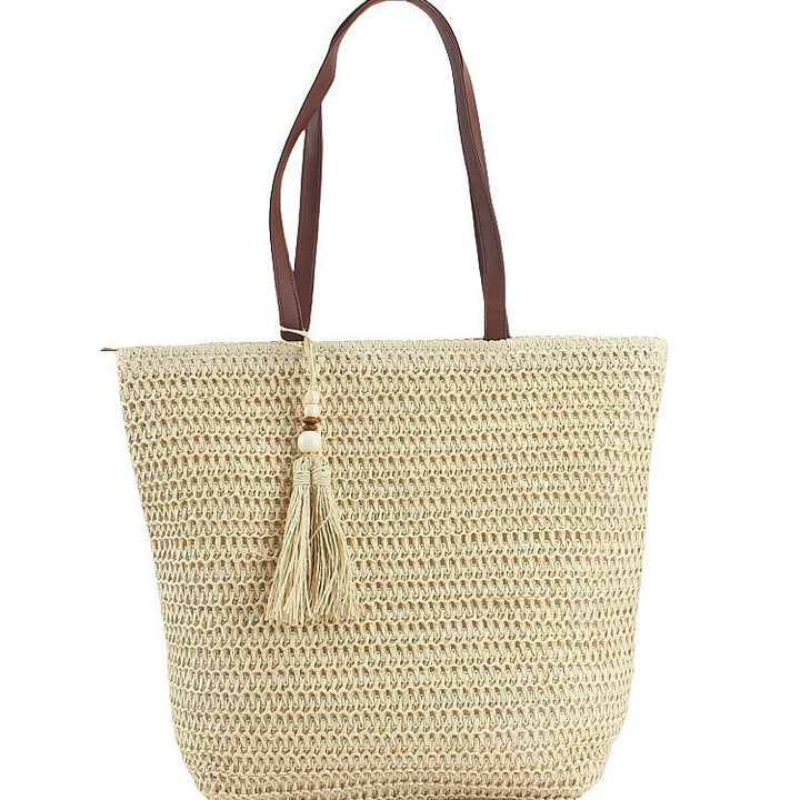 Geräumige Clutch aus geflochtenem Naturmaterial mit dekorativer Quaste Skanto