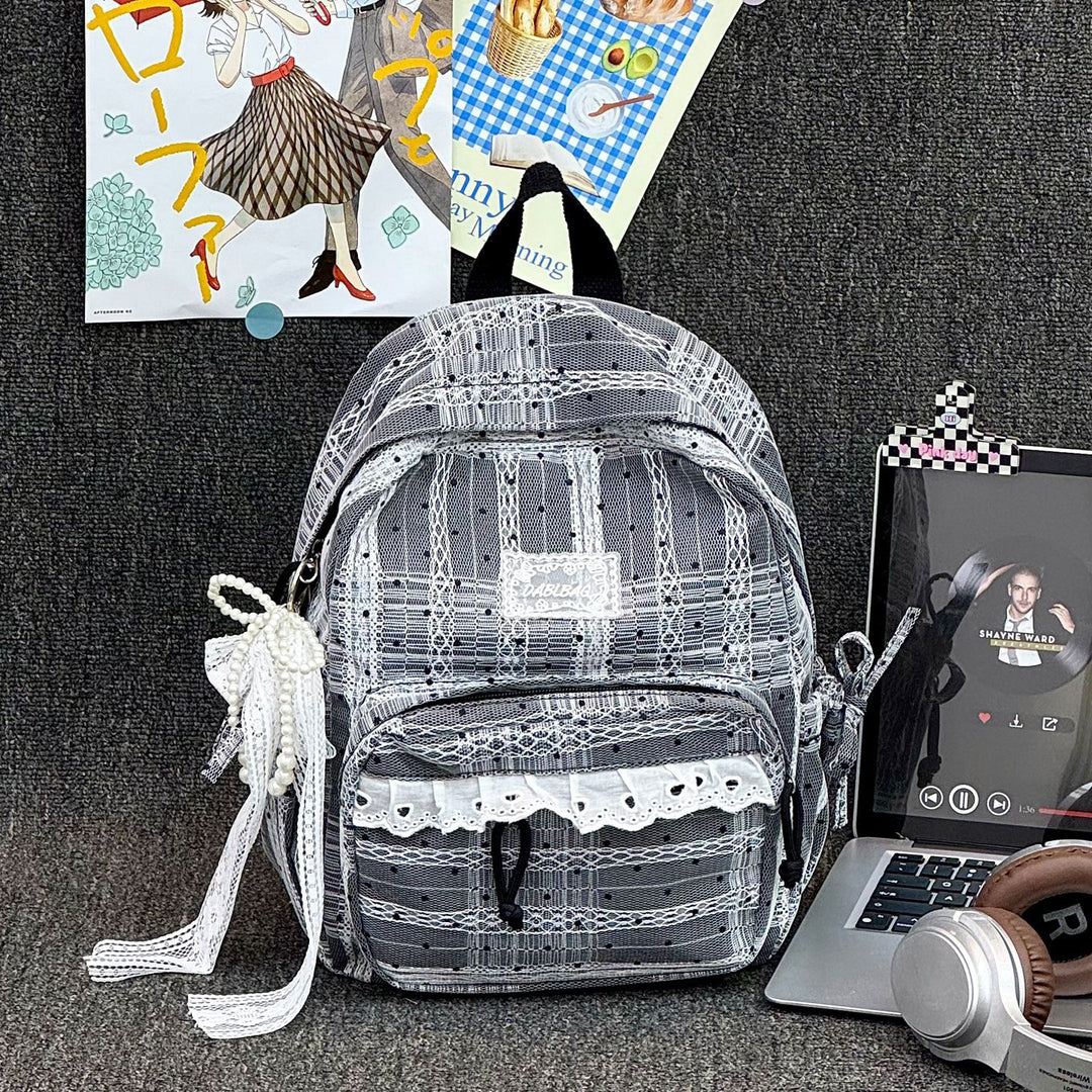 Charmante Schultasche mit Tupfenmuster und Spitzenbesatz