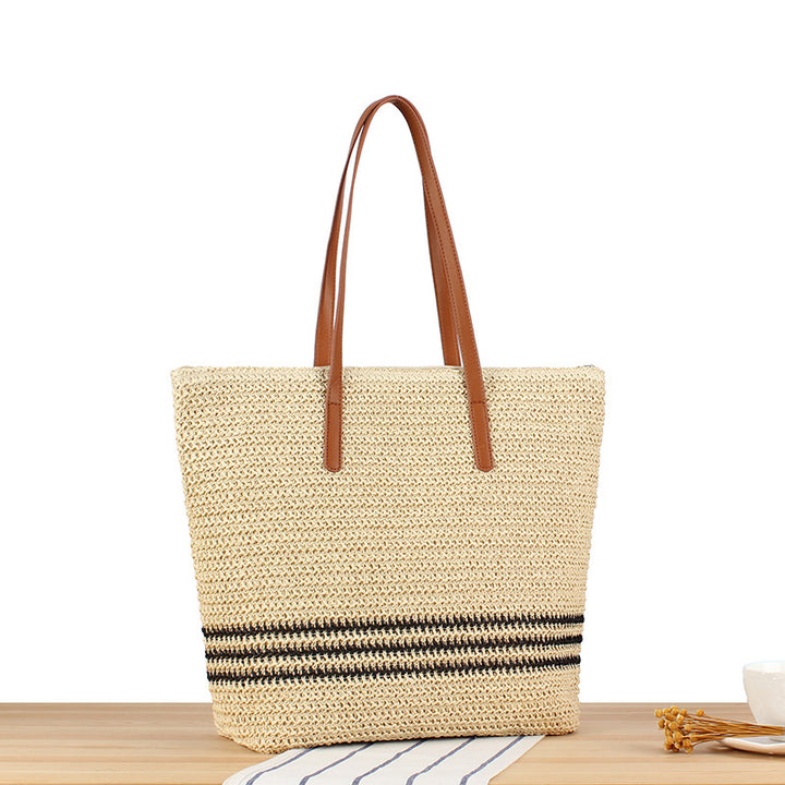 Stylische Strandtasche aus Naturgeflecht mit Ledergriffen Skanto