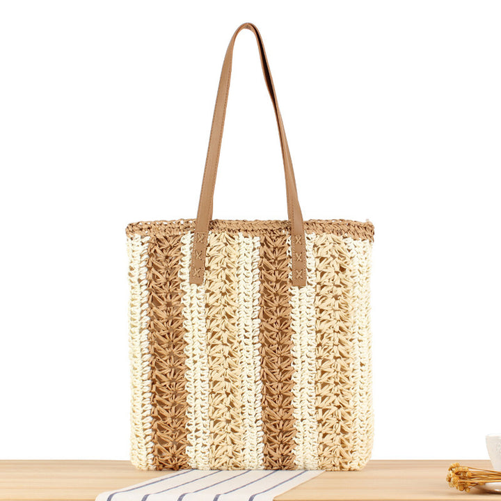 Strandtasche aus gewebtem Naturmaterial mit stabilen Ledergriffen Skanto