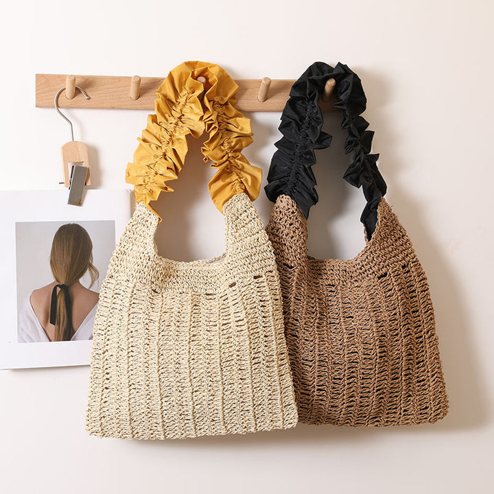 Elegante Handtasche mit gerafftem Ziergriff Skanto