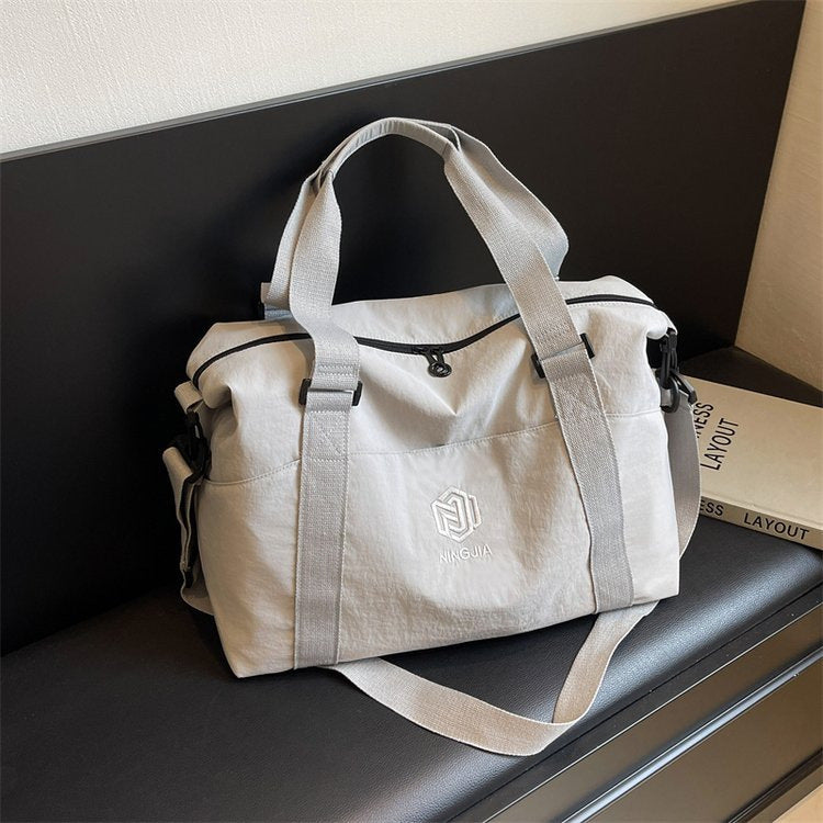 Sportliche Tote Bag mit mehreren Fächern und verstellbaren Riemen Skanto