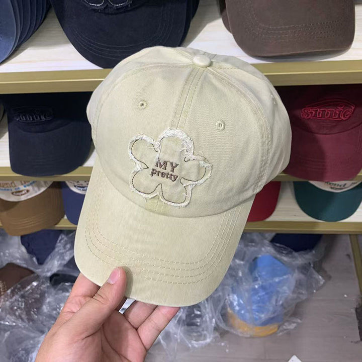 Damen Baseballkappe im Used-Look mit Blumenstickerei Skanto