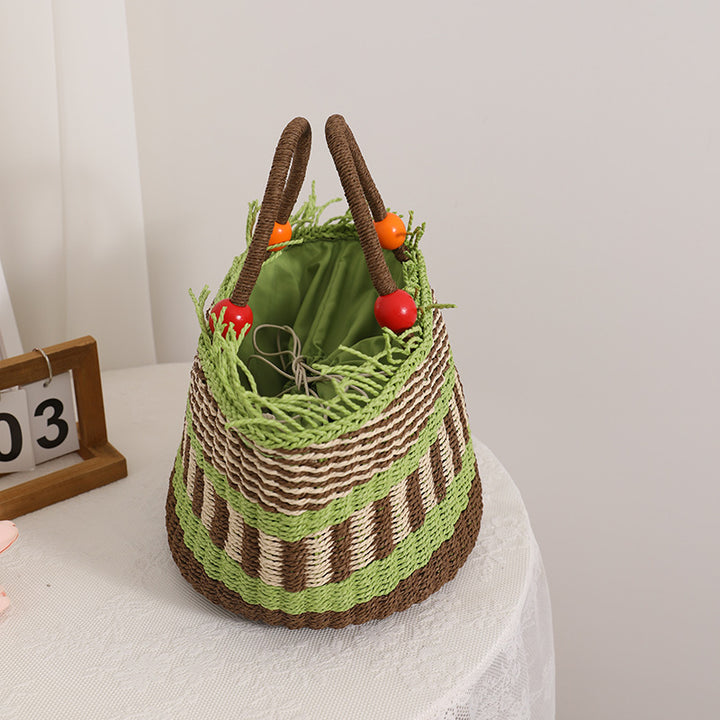 Handgemachte Korbtasche mit fröhlichem Gartenmotiv Skanto