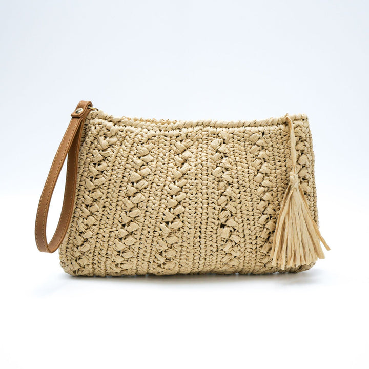 Handtasche aus geflochtenem Naturmaterial mit Quaste Skanto