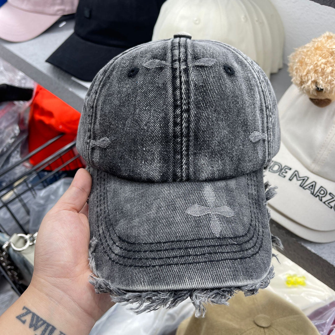 Damen Baseballkappe im Used-Look aus Jeans mit Fransen Skanto