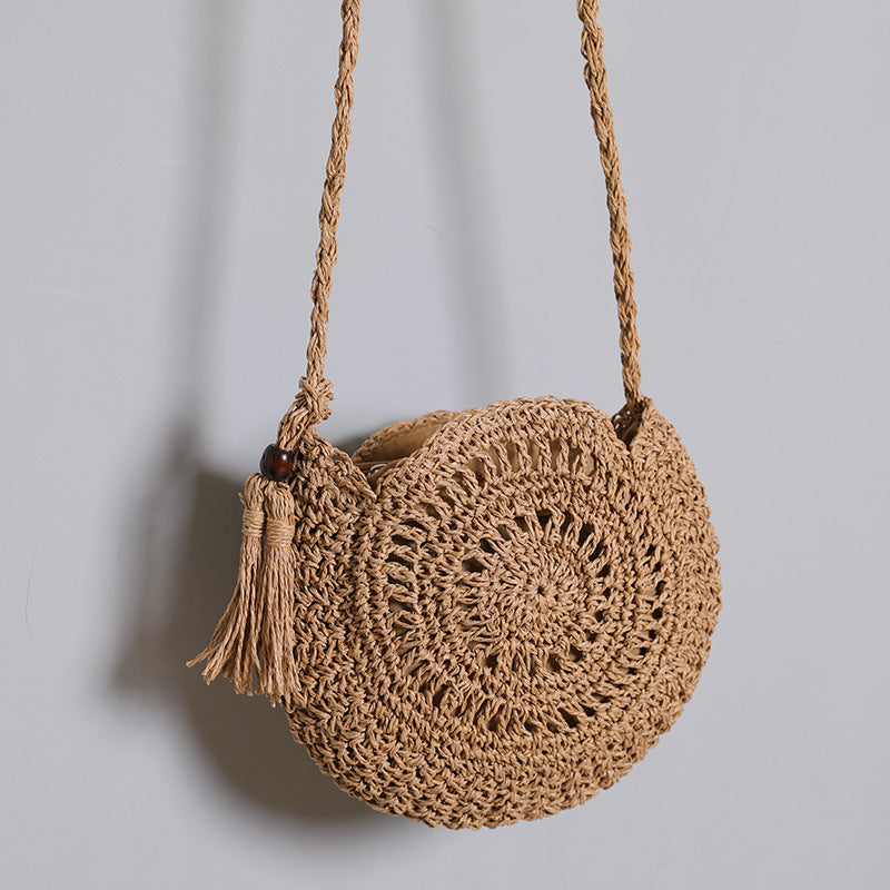 Runde Tasche aus natürlicher Jute mit trendigem Fransen-Detail Skanto