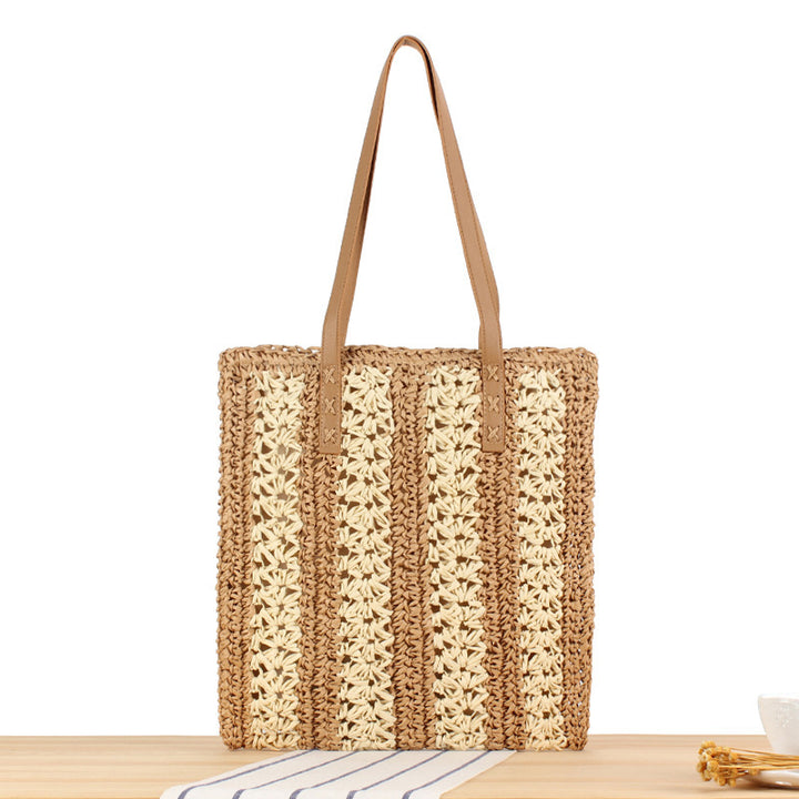 Strandtasche aus gewebtem Naturmaterial mit stabilen Ledergriffen Skanto