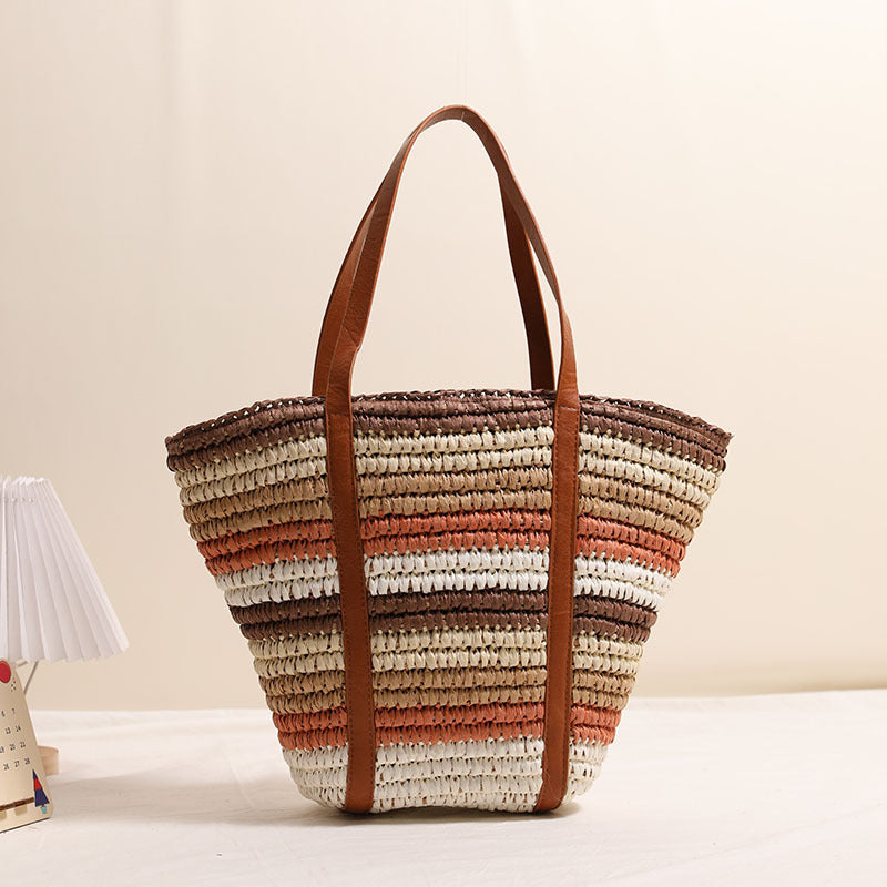 Geflochtene Strohtasche mit robusten Ledergriffen Skanto