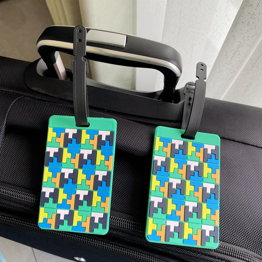 Lebhafter Puzzle-Muster Kofferanhänger Skanto
