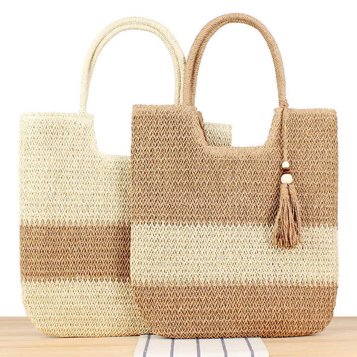 Moderne Strand-Einkaufstasche aus gewebtem Naturmaterial mit Fransen-Details Skanto