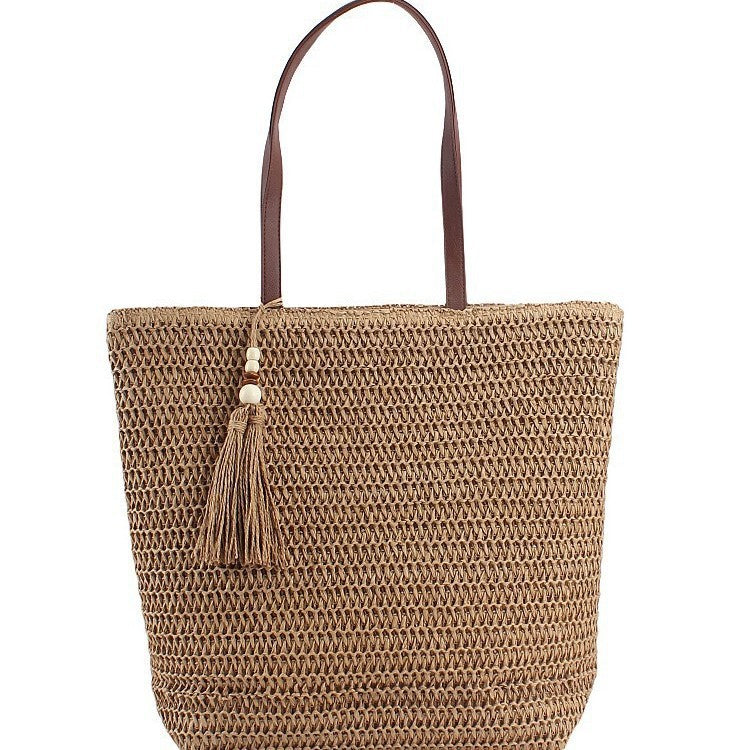 Geräumige Clutch aus geflochtenem Naturmaterial mit dekorativer Quaste Skanto