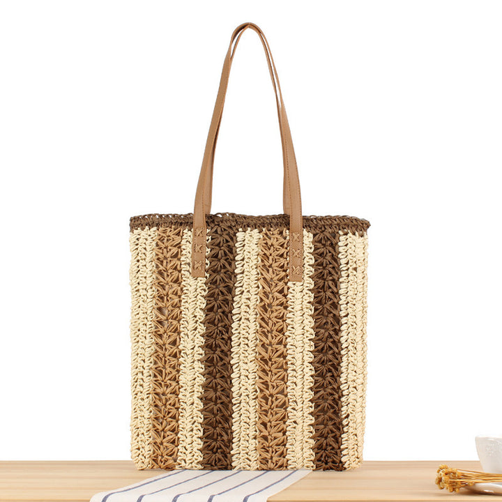 Strandtasche aus gewebtem Naturmaterial mit stabilen Ledergriffen Skanto