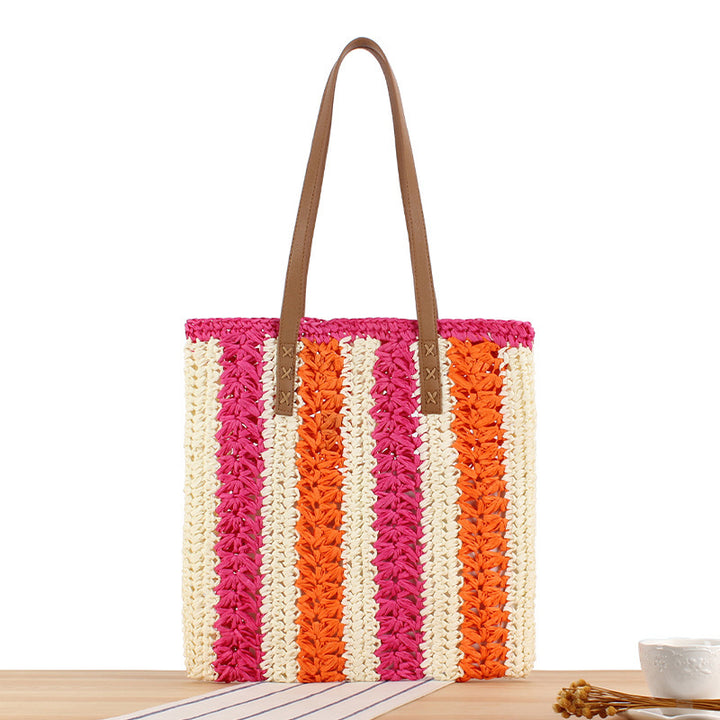 Strandtasche aus gewebtem Naturmaterial mit stabilen Ledergriffen Skanto