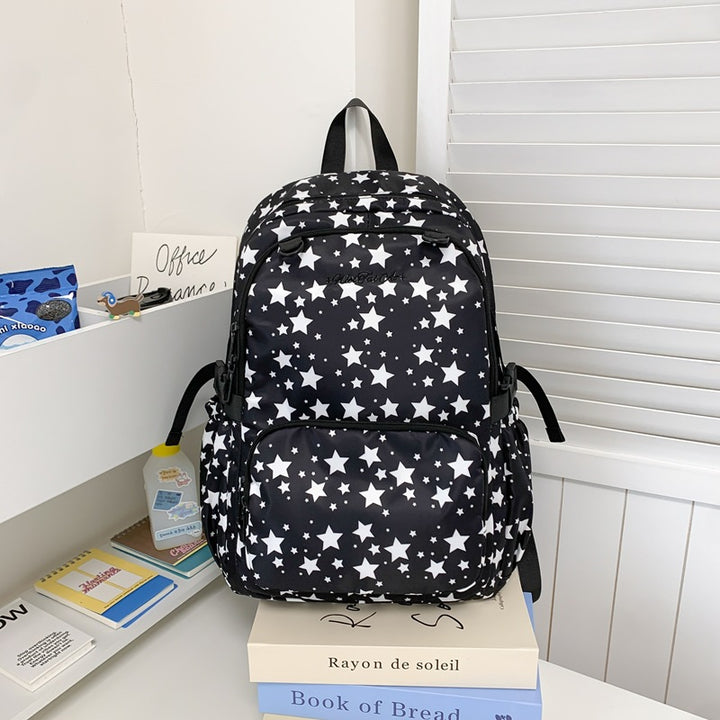 Rucksack Skanto mit Sternenmuster und vielen Taschen