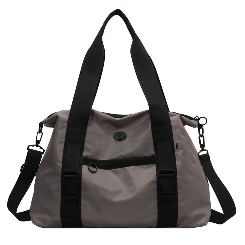 Geräumige Sport-Reisetasche mit ergonomischen Tragegriffen und wasserabweisendem Material Skanto